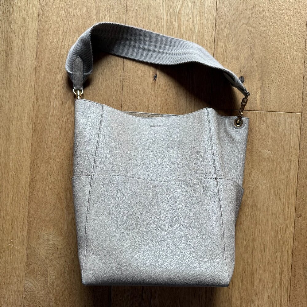 An icon:  Celine Seau Sangle bag in perfect taupe, worn twice!